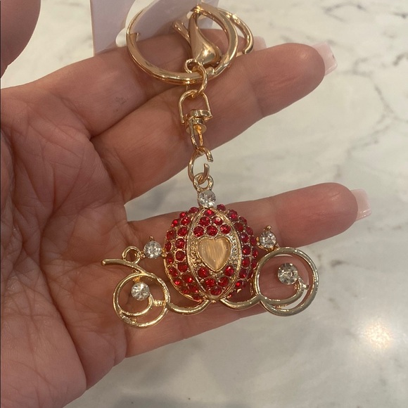 Elegant Gold and Red Carriage Keychain - Picture 1 of 4